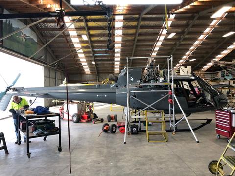 Central Aero Engineering helicopter in hanger